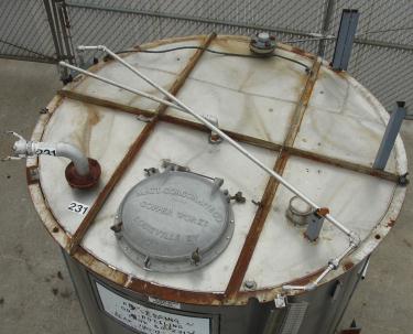 790 gallon vertical tank, stainless steel, sloped bottom