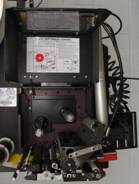 Labeler PCM Image-Tek pressure sensitive labeler model Online 9000 Series, tamp-on, 600 per min