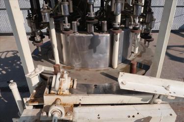 Filler 22 valve U.S. Bottlers liquid gravity filler 5.5 centers, up to 220 cpm